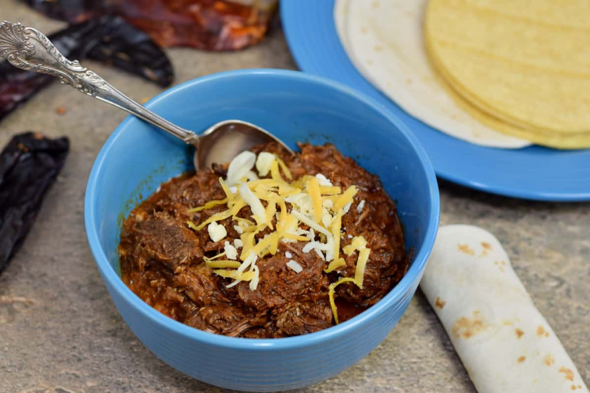 Chili Colorado served with both corn and flour tortillas.