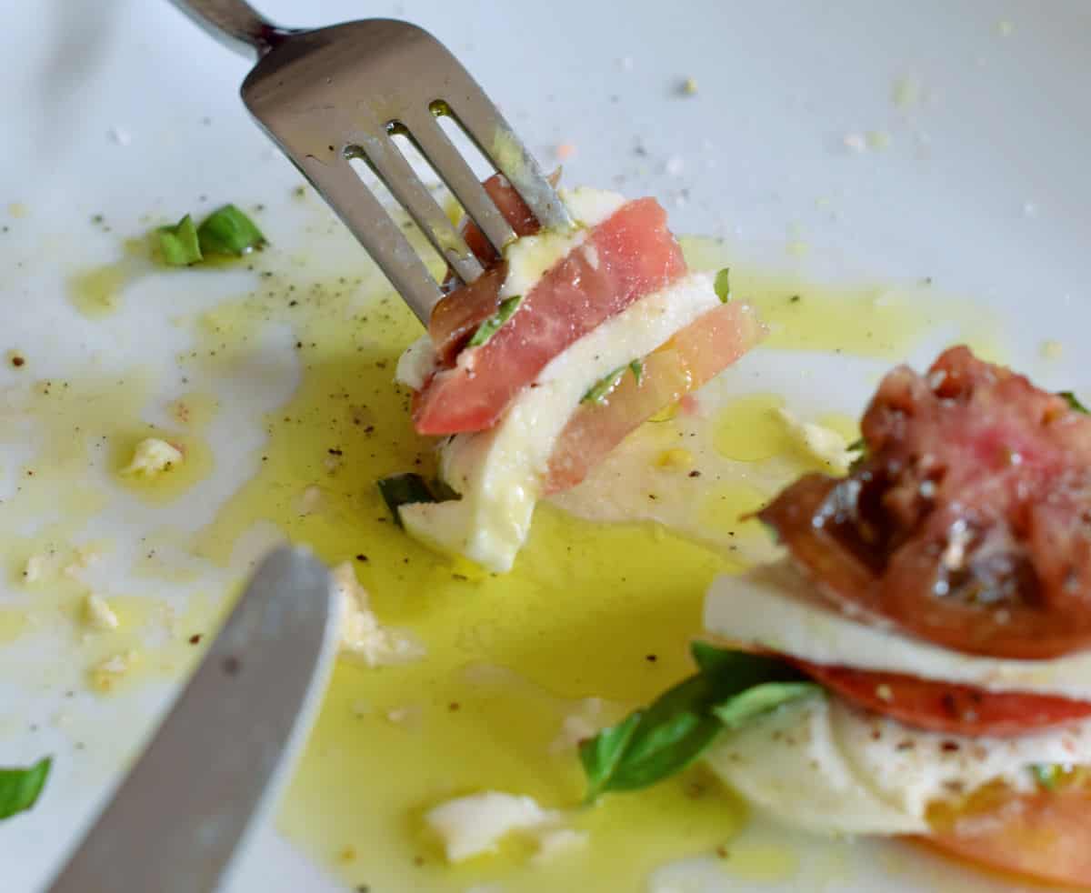 A perfect bite of caprese salad.