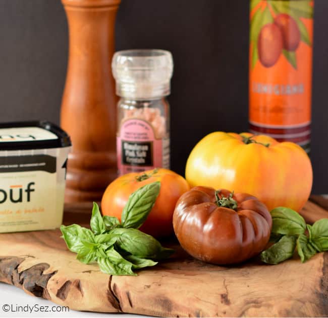 All the ingredients needed to make a classic caprese salad.