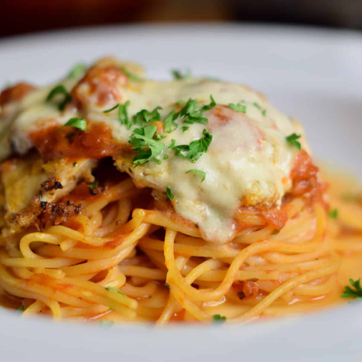 A plate of quick and easy homemade chicken parm.