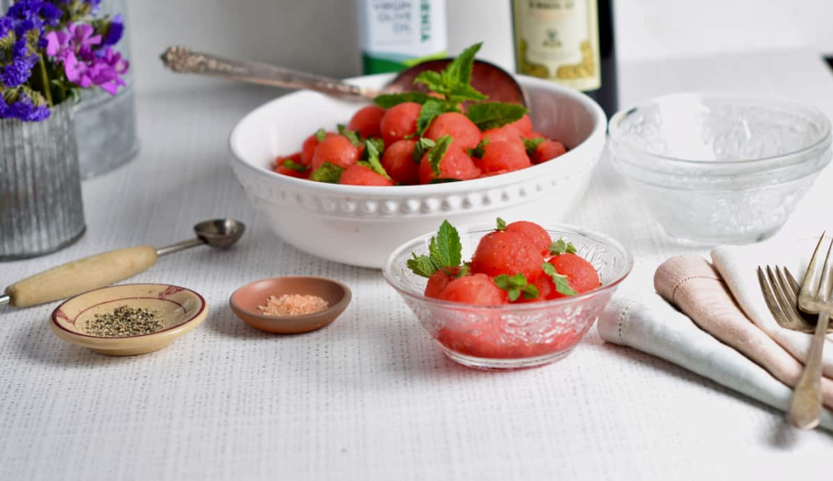 Watermelon Salad looking cool and refreshing in a white bowl.