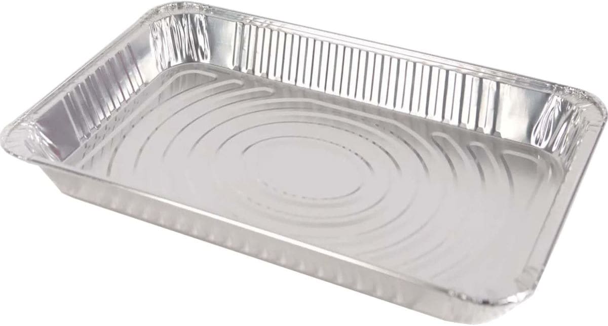 An aluminum baking dish for cooking wings.