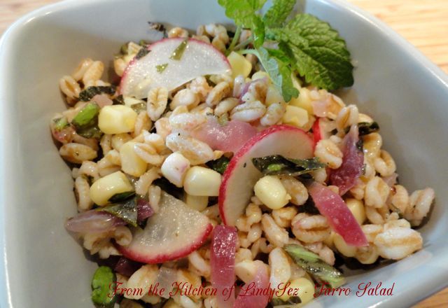 Farro Salad in a bowl with garnish.