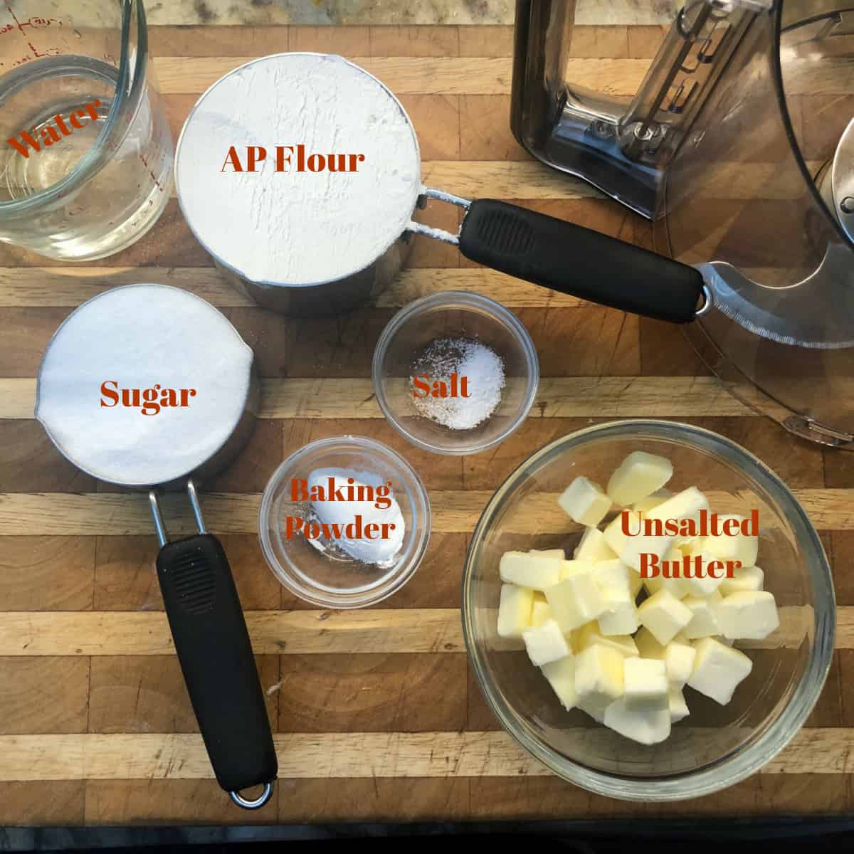 The biscuit topping ingredients on a cutting board.