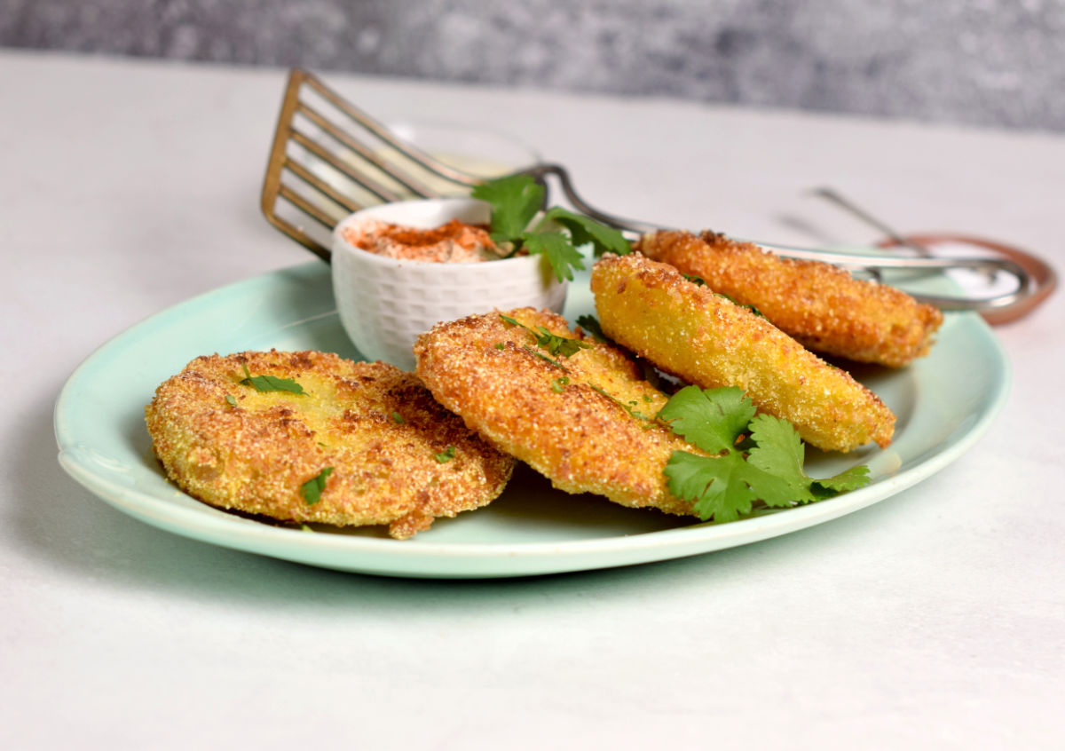 A plate of perfectly browned fried green tomatoes.