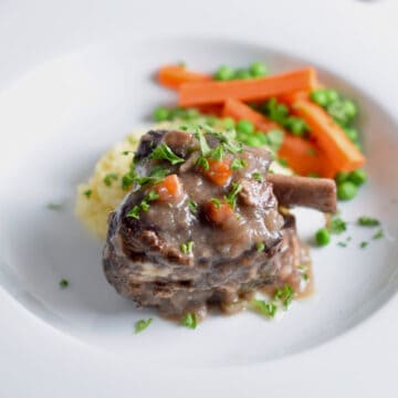 A finished plate of German Style Slow Braised Short Ribs.