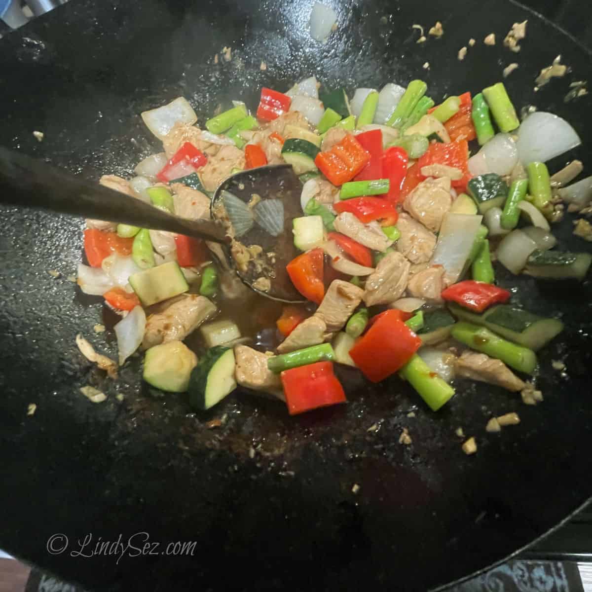 Stir frying the chicken stir fry