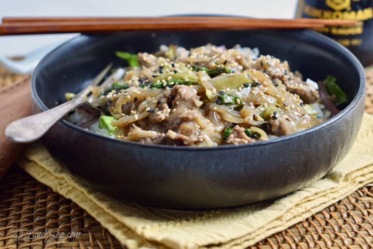 Rice bowl with beef and bok choy. 