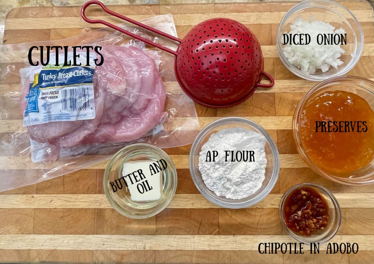 Ingredients set on a board for making sweet spicy cutlets.