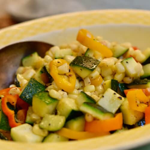 Fresh corn and zucchini are sauteed then served as an easy side dish.
