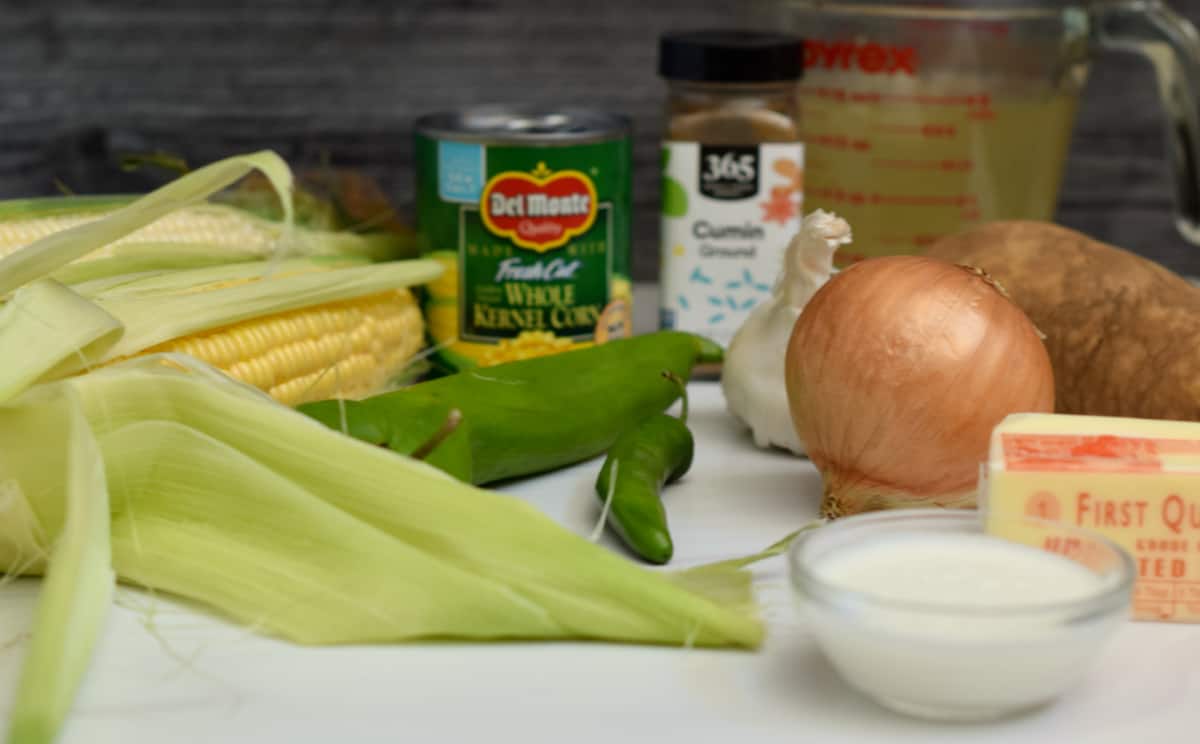 The ingredients needed to make roasted corn soup.