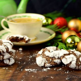 Chocolate Crinkle Cookies with a cup of coffee.