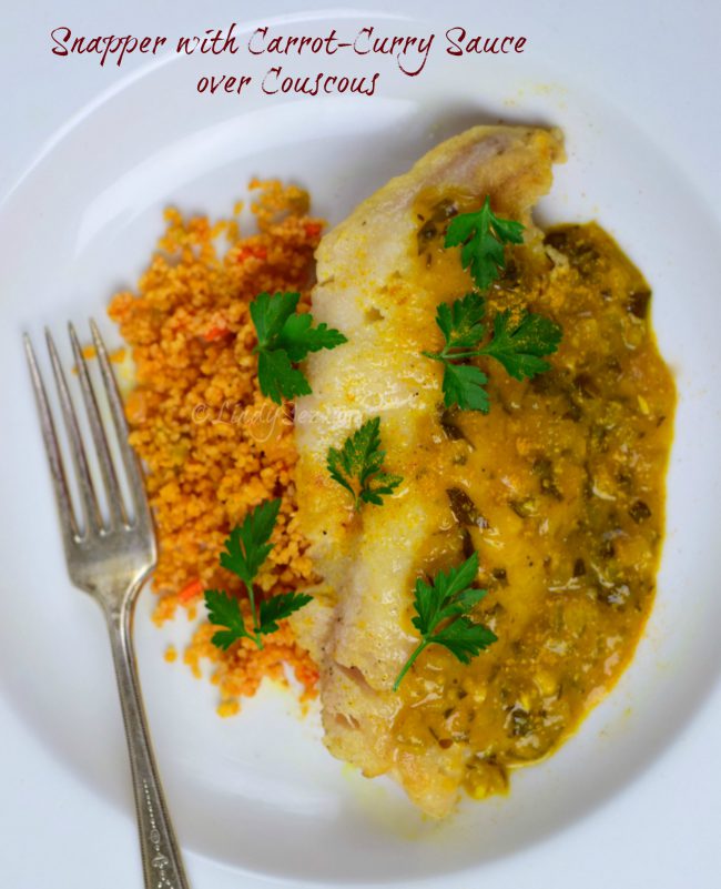 Snapper with carrot-curry sauce over couscous