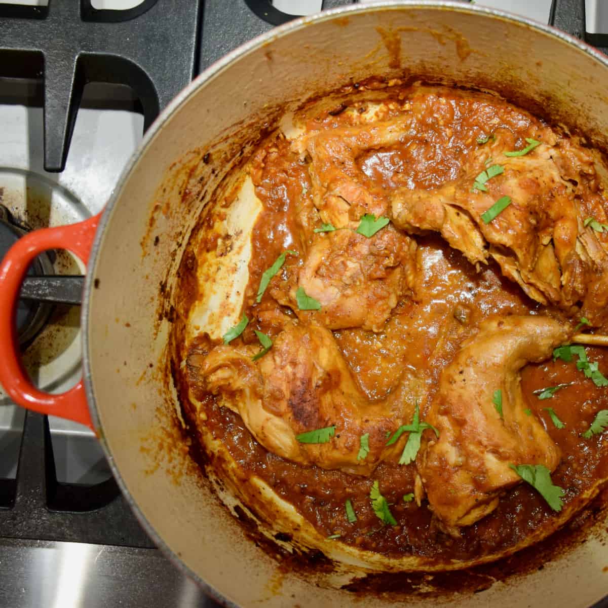 Non-Traditional Rabbit Curry being stewed in a pot.