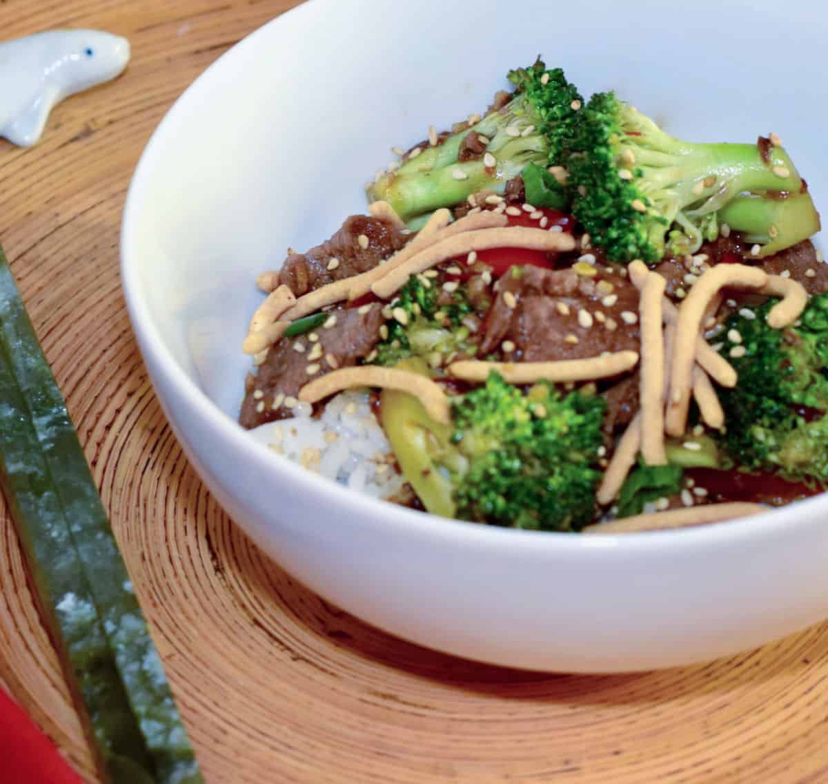 A bowl of Beef Broccoli stir-fry with noodles in a bowl.