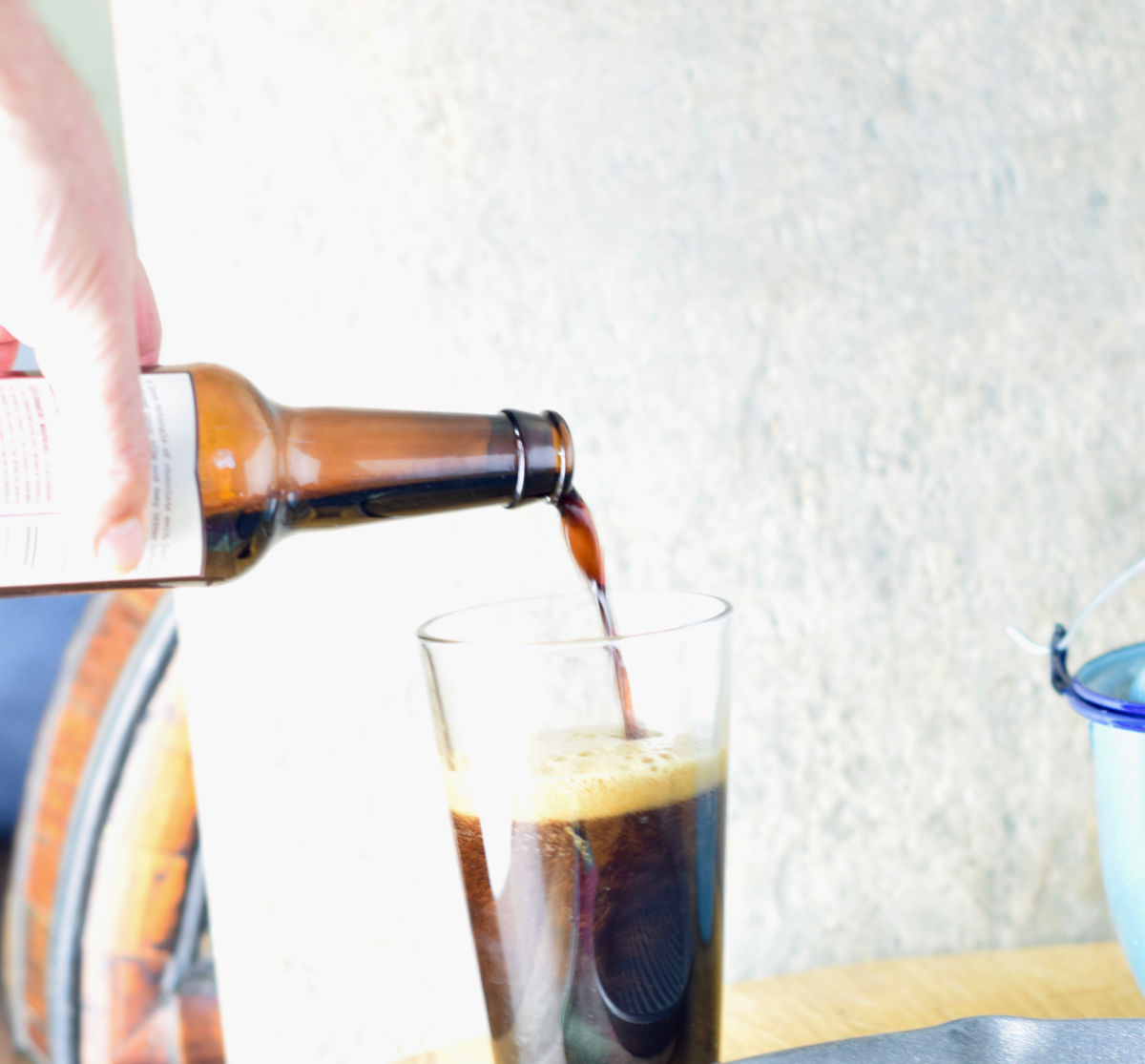 Beer being poured into a glass.