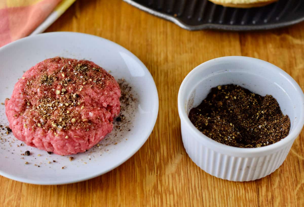 Ingredients for Coffee-Crusted Cheeseburgers including espresso powder, black pepper, brown sugar, ground beef, bacon, cheddar cheese, and chipotle BBQ sauce ingredients.