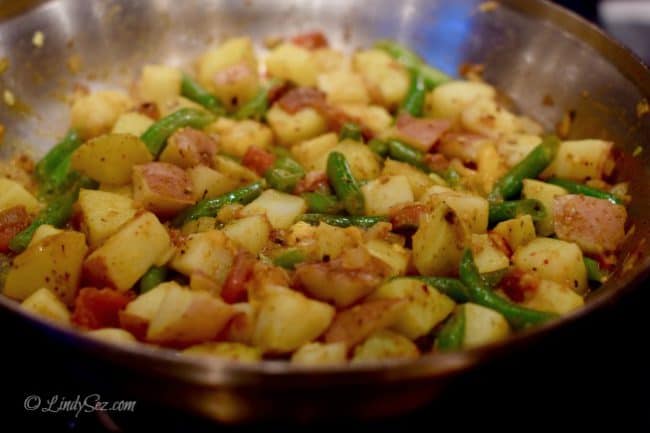 cooking up some easy curried potatoes and green beans