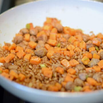 Farro Sweet Potato Breakfast Hash in a white bowl.