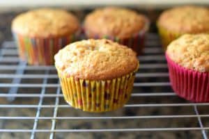 A rack OD Papaya Pecan Coconut Muffins.