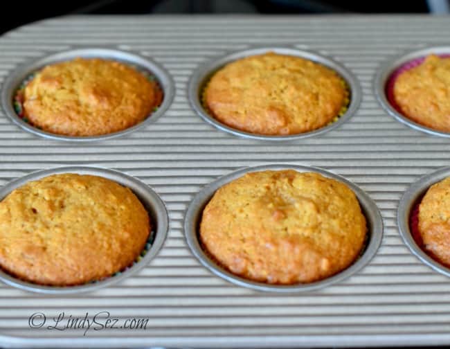 A pan of cooked Papaya Pecan Coconut Muffins