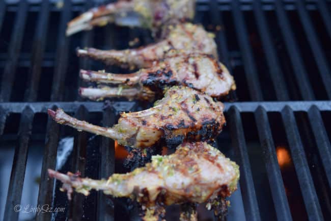 The Slanted Doors Lemongrass Grilled Lamb Chops on the grill getting a nice char.