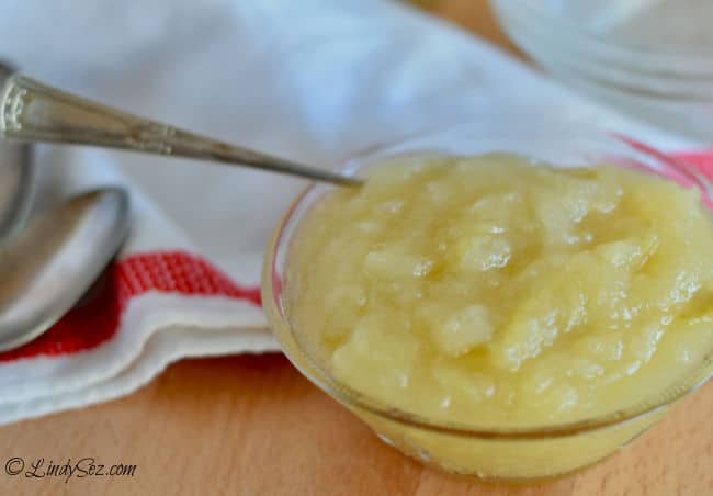 A bowl of chunky style homemade applesauce.