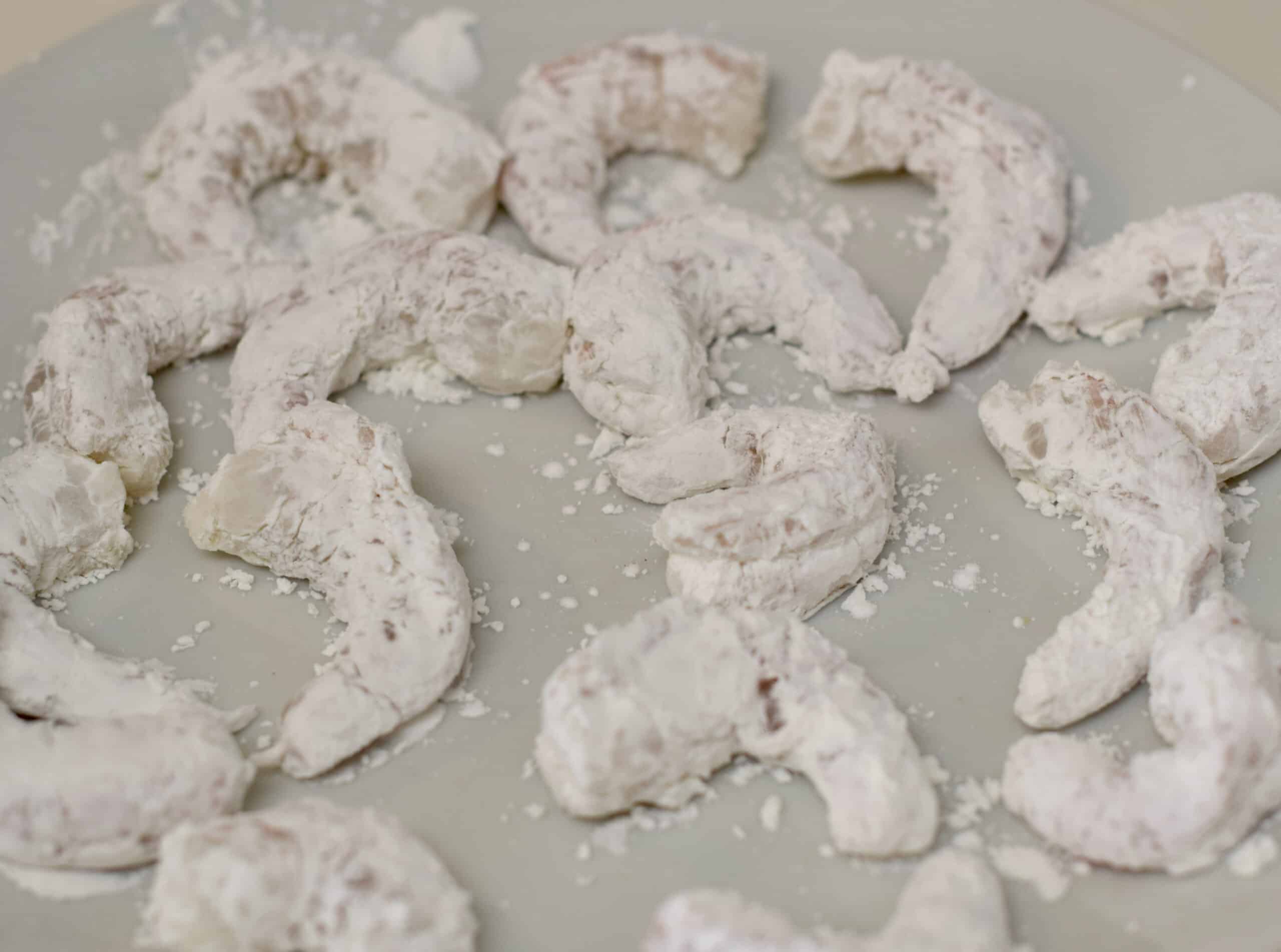 Shrimp with a light coating of rice flour ready for the pan to make some Spicy sweet and sour shrimp.
