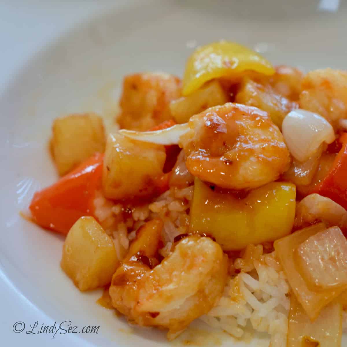 The final dish of easy homemade spicy sweet and sour shrimp.