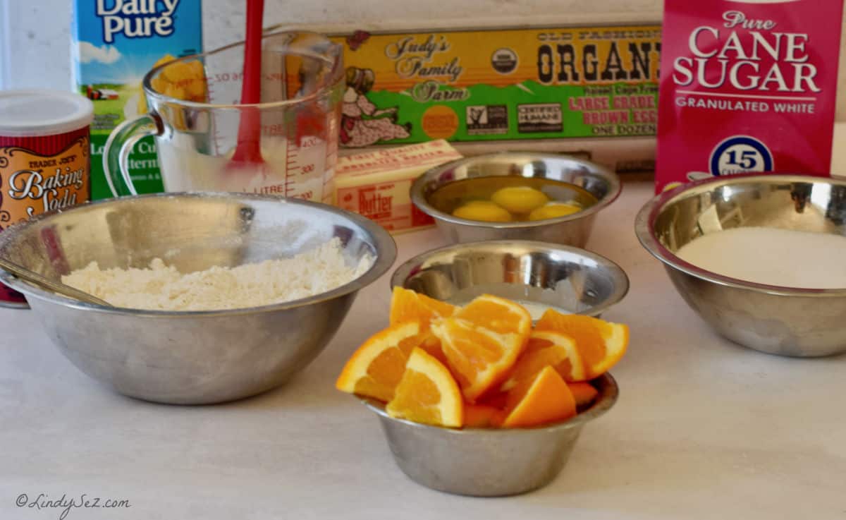 The ingredients needed to make the recipe for all in whole orange cake.