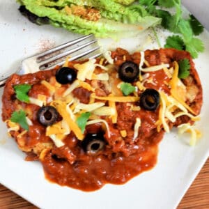 Turkey Enchiladas with Homemade Chili Gravy with a salad.