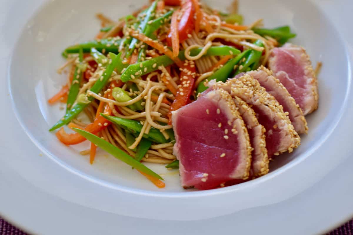 A colorful bowl of Sear Ahi Tuna with an Asian Soba Salad.