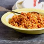 Mexican (Spanish) Style Cauliflower rice witha spoon for serving.